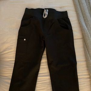 Black drawstring Figs. Hardly used and in great condition.